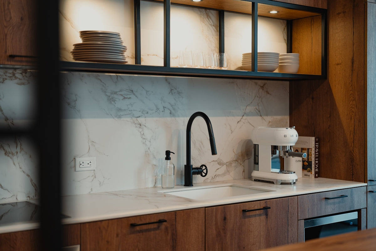 Modern kitchen sink with coffee maker and dishes
