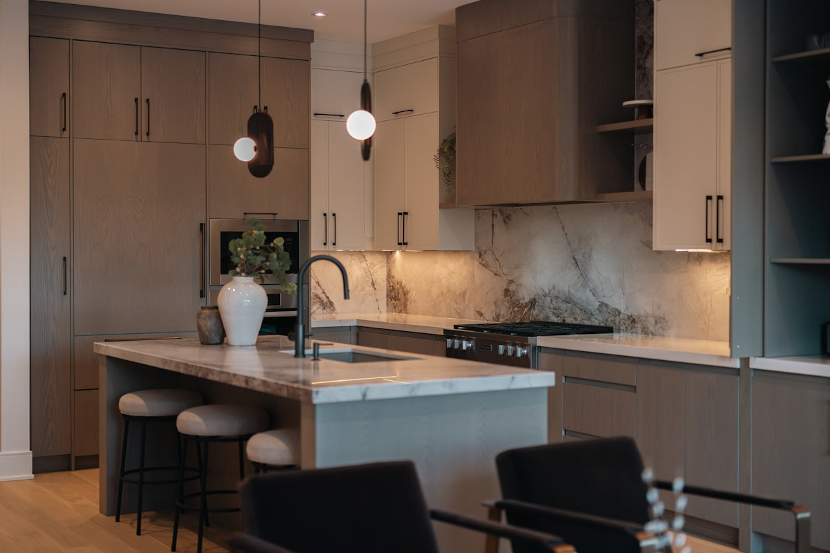 Modern kitchen with island and marble backsplash